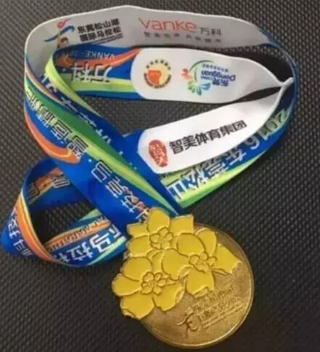 以莞香花设计的莞马奖牌-ob电竞